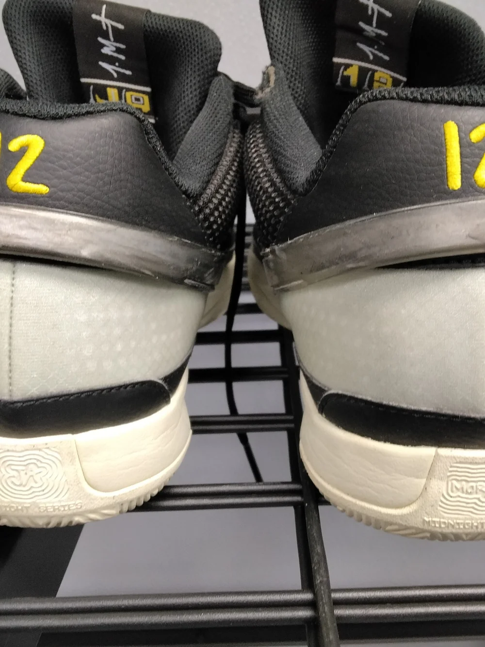 Nike Men’s Black Athletic Sneakers with Yellow Accent